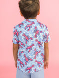 Load image into Gallery viewer, Blue Lobster Lagoon Performance Polo
