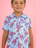 Load image into Gallery viewer, Blue Lobster Lagoon Performance Polo
