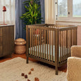 Load image into Gallery viewer, Babyletto Natural Walnut Pogo 8-in-1 Convertible Crib
