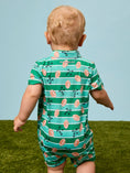Load image into Gallery viewer, Tackles & Touchdowns Football  Performance Polo Romper
