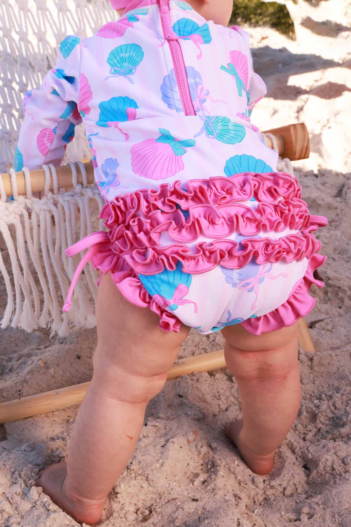 Seaside Sweetie Long Sleeve Ruffle Bottom Swimsuit